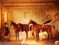 Chasseurs de sir John Thorold Bay avec leur époux dans un cheval stable John Ferneley Snr